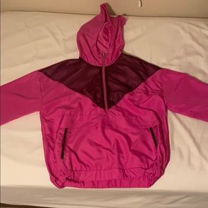 Selling this pink and black zip up windbreaker.